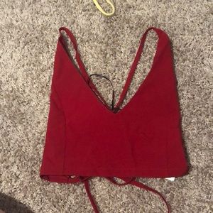 Red deep v crop top. Cross in the back
